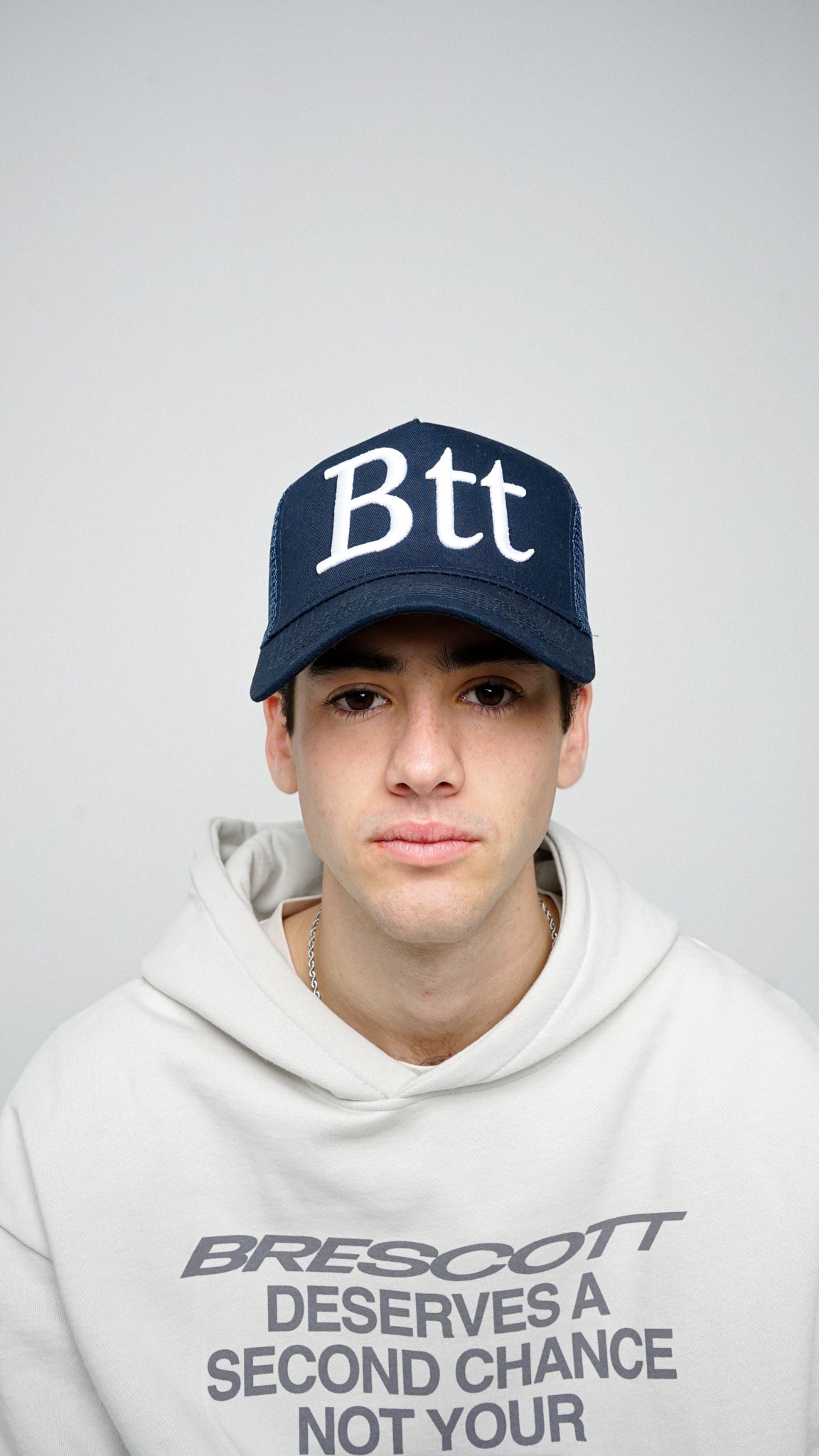 BACK IN" NAVY TRUCKER CAP